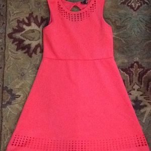 Coral colored dress with a zipper in the back
